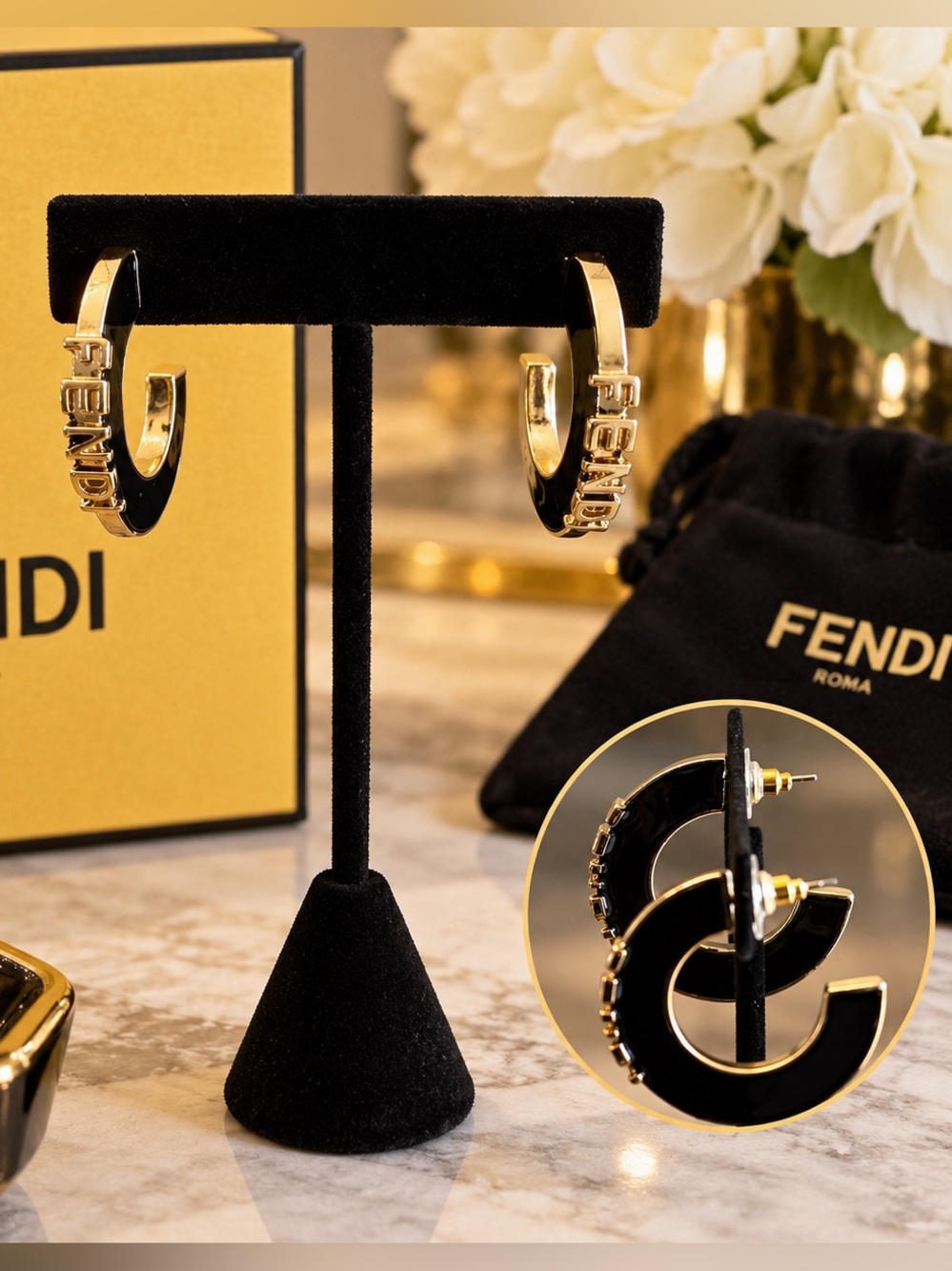 Elegant Gold and Black Logo Hoop Earrings
